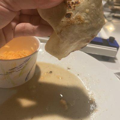 Soggy Burrito and "Mexican" rice. Burritos shouldn't have this much liquid ever.