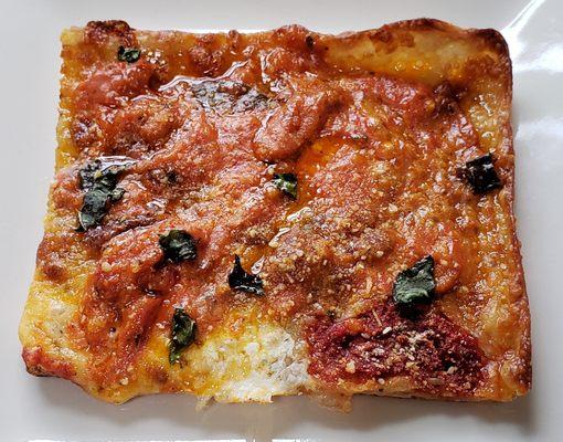 Grandma Vodka slice: very thin crust, but chewy and greasy with a scant flavor profile.