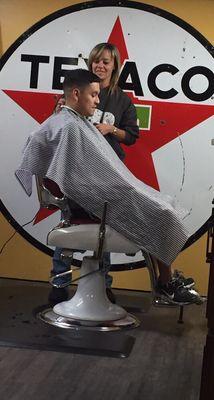 Our other licensed Barber Cassie getting this fella cleaned up!