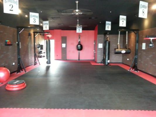 A 30-minute, full-body, kickboxing! No class times and a trainer is always included!