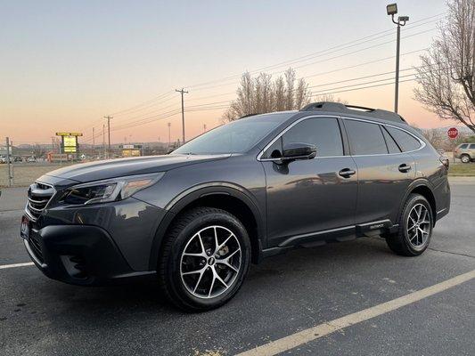 After tinting front driver and passenger windows (20%) and a strip at the top of the windshield (15%).