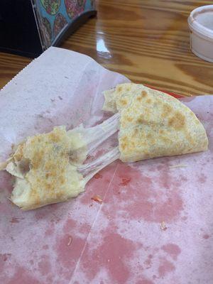 Ooey-Gooey Cheese-pull from the Chicken Quesadilla.