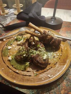 The herb-crusted rack of lamb with roasted Brussels sprouts, mint pesto and balsamic glaze