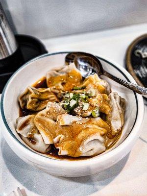 Wontons with peanut sauce and chili oil