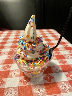 Roadie- vanilla soft serve with rainbow sprinkles