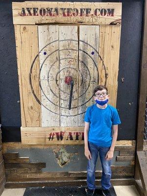 My son and the bullseye he hit.