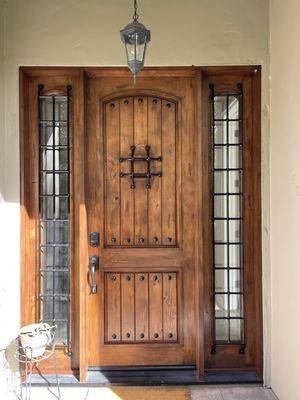 Front door sanded re-stained and clear coated. Also all metal sanded rust primed and painted.