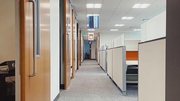 Interior Hallway showing offices and work stations at the Swanson Russell office in Aksarben Village in Omaha, NE