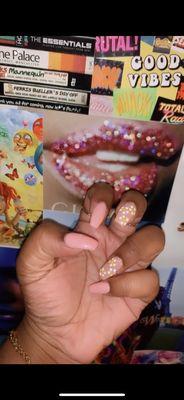 My acrylic nails with a floral design