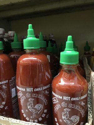 Many different brands of Sriracha