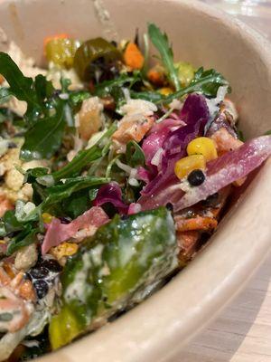 Greens and grains bowl with veggies