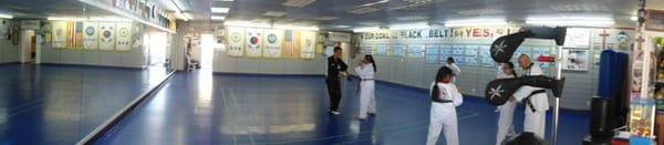 Grand Master working individually with a student.