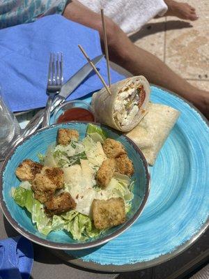 Turkey wrap with a side Caesar salad