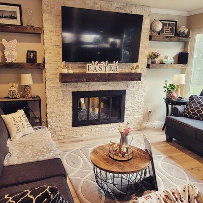 Living room remodeling..custom mantel and shelves and fireplace refacing