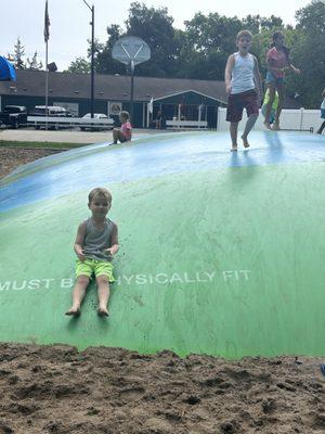 Huge Jump pillow located by the activity center and pool