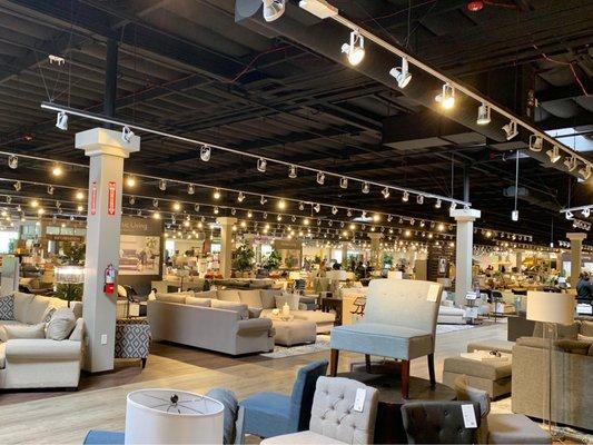 Massive furniture store - clear segregation between regular items and outlet items.