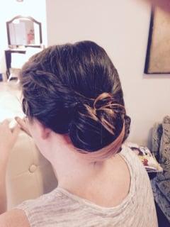 This picture turned out the best of our in-salon pics we took. It's the hair of one of my bridesmaids. (Pink hair strand dyed by us earlier)