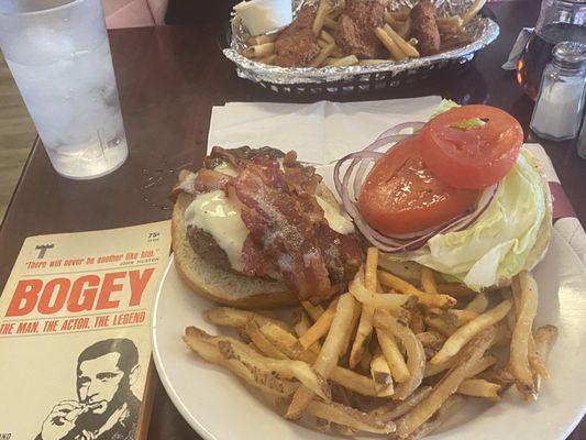 Bacon Cheese Burger with a side of fries.