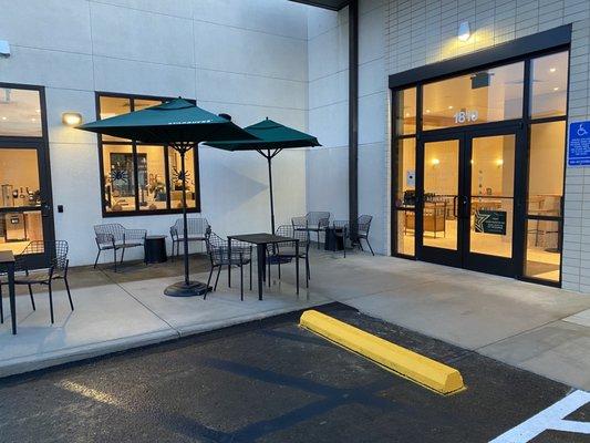 Outside patio seating and up close ADA parking