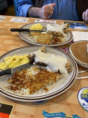 One order Chicken Fried Chicken & 2 Eggs with hashbrowns and a pancake split soooo much food but yummy