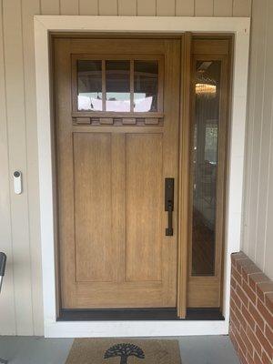 Fiberglass front door with sidelite