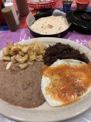 Huevos rancheros with barbabcoa with homemade tortillas was excellent!