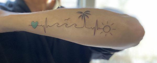 Beach vibe tattoo! Me and my BFF's got themed tattoos prior to our girls trip.  I LOVE it