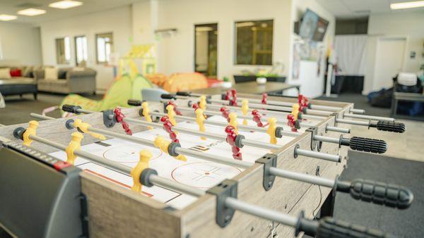 We have a foosball table, pool table and hockey table.