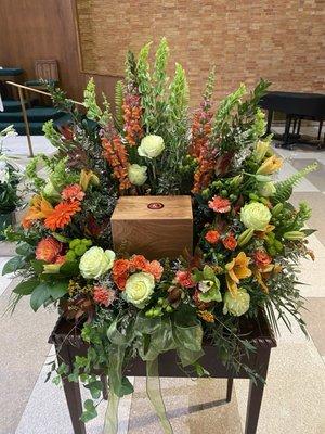 Gorgeous urn surround bouquet by Country Daisy Flower shop