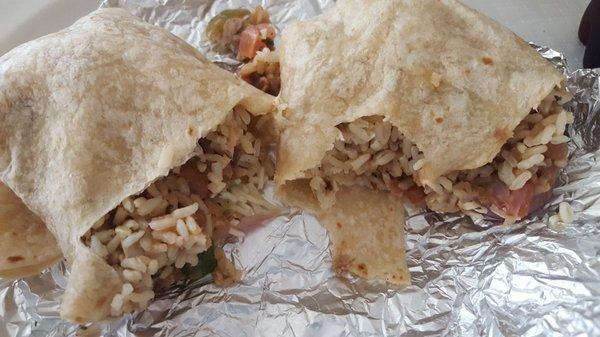 Veggie burrito with rice, onions and green peppers, cheese, salsa and pinto beans.