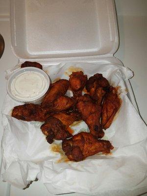 Underestimated wings. It is a bar so drinking,smoking but the grub is pretty decent. Pairs well with a miller lite!