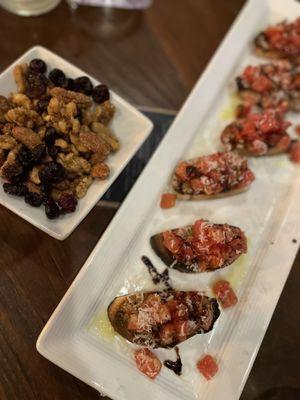 Spiced nuts and bruschetta.