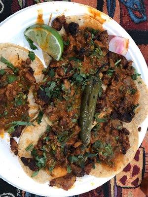 Al pastor tacos w/ no ceballos (that's onions in Spanish)