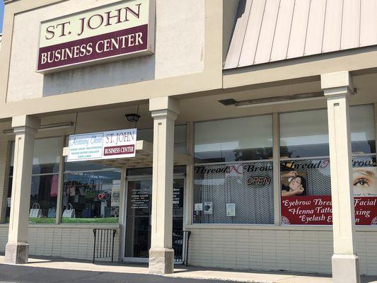 We are located in the St. John Mall- entrance is under the St. John Business Center sign