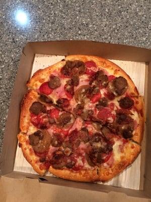 It may not look incredibly appetizing but trust me..this is good pizza! Recommend the All Meat for meat lovers!