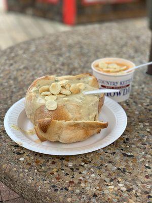 New England Chowder in a bread bowl and the lobster bisque in a cup.