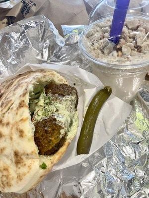 Falafel pita with green schug and Turkish coffee tahini