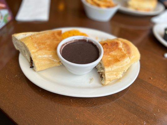 Pan con bistec (side I of yellow rice & black beans)