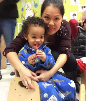 Mommy and son enjoying a special moment at our holiday gathering.