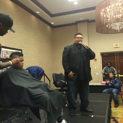 Billco at the MLB show teaching a class on the Buisness of barbers.