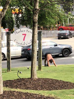 This dude decided to do about 30 minutes of stretching on the lawn in front of the restaurant. What ⁉