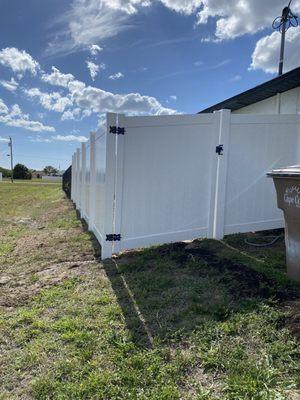 Side fence to cover water tank and a/c.