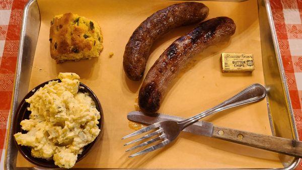 Hot link, brat, jalapeño cornbread and potato salad