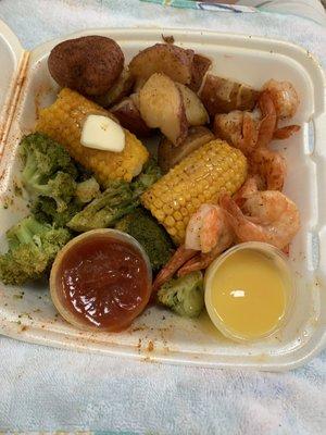 Large shrimp platter with extra side of corn