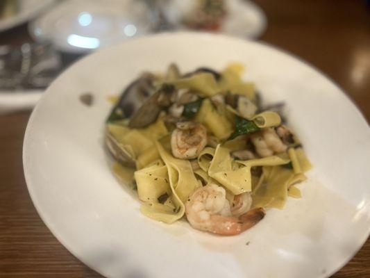 Pappardelle Mare E Monti.
 The base was a water sauce, zero taste, no butter, cream, cheese, lemon, garlic or salt.