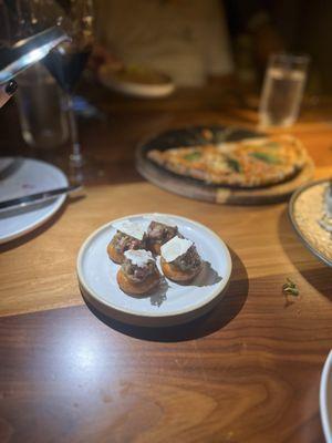 Beef tartar in crispy bao and shaved parmesan