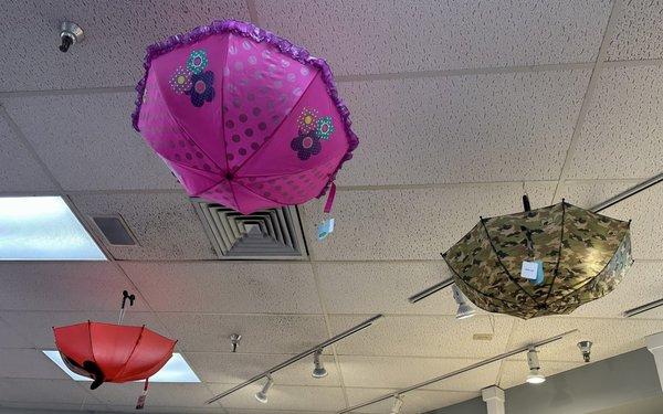 Cute umbrellas decorate the ceiling.