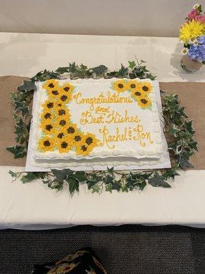 The cake was made there too-- white with raspberry filling-- and decorated to match our sunflower theme!  It was delicious!