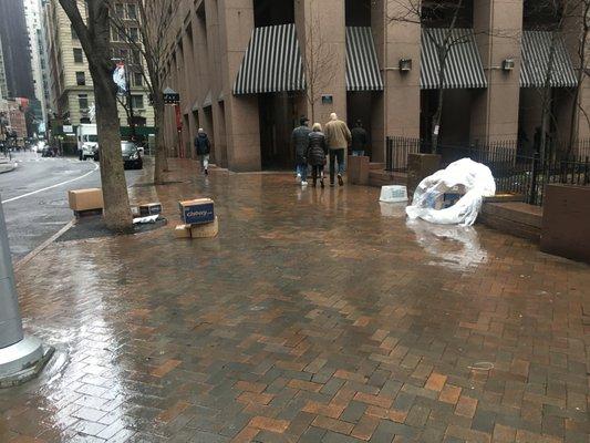 They leave packages totally unattended (or maybe just abandoned?) on the sidewalk in their Financial District staging area...