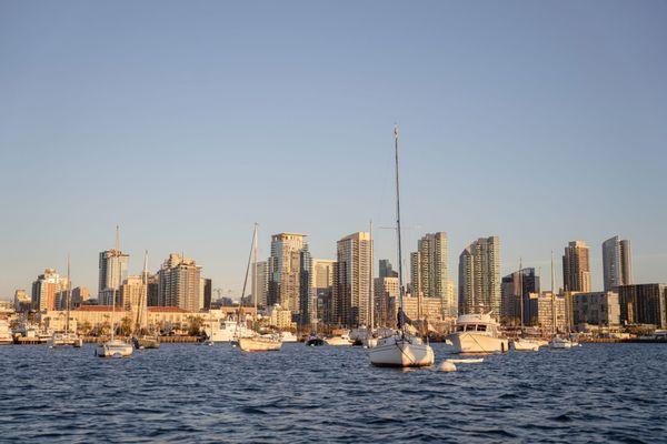 Sightseeing cruise in San Diego bay on Pink electric Boat. Explore Maritime and Midway museum, Coronado bridge areas.